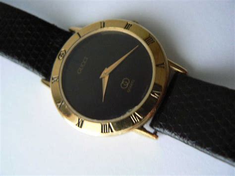 gucci watch with a black face 80s